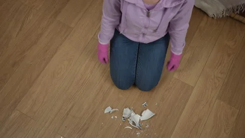 Accidental Breakage A thorough cleanup operation is currently in progress Stock Footage 309380678