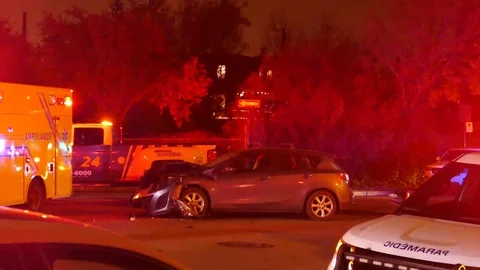 Accidented Mazda at night Stock Footage 100618718