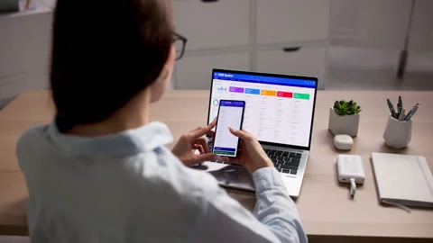Account Manager Studies Sales Data On Laptop Video stock 334532687