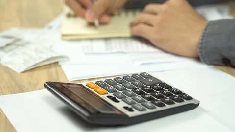 Accountant businessman making calculation Video stock 113147199