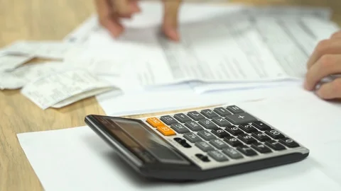 Accountant bussinessman checking list calculation hand pen working Video stock 113147062
