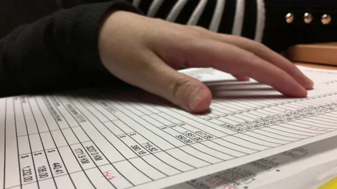 An accountant calculating expenses and explaining for customer Stock Footage 208339076