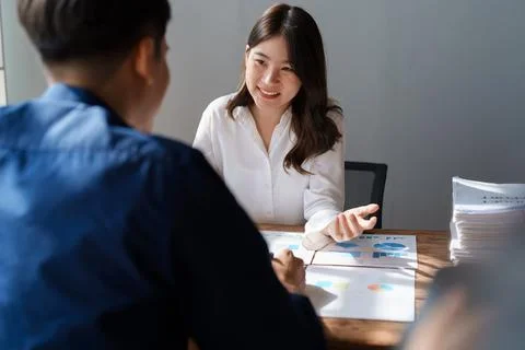 Accountant checking financial statement or counting by calculator income for tax Stock Photos