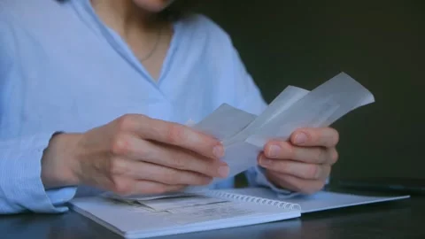 Accountant checking receipts and bills, managing expenses and budget Video stock 312982145