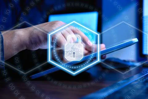 Accountant man using tablet computer and digital lock icon hologram 写真素材