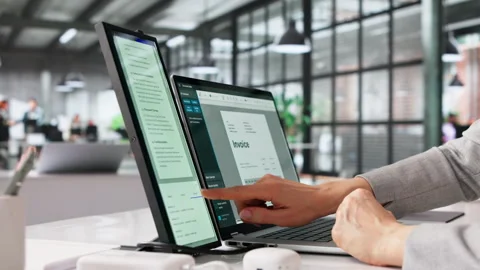Accountant Reviewing Electronic Invoice On Computer Monitor Vídeo Stock 331523235