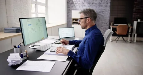 Accountant Using E Invoice Software At Computer Stock Footage 236395181