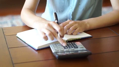Accountant Working With Calculator Video stock 81949912