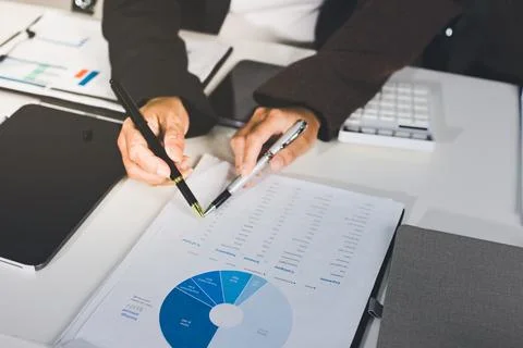 Accountants processing financial documents and taxes, managing corporate fi.. 写真素材