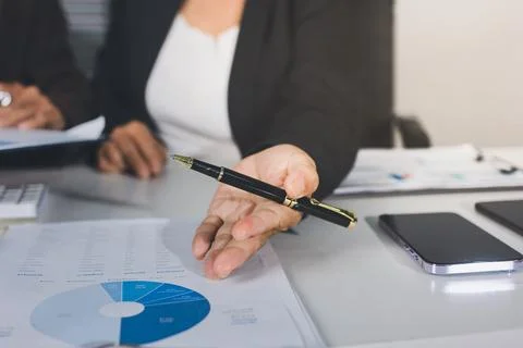 Accountants processing financial documents and taxes, managing corporate fi.. Foto stock
