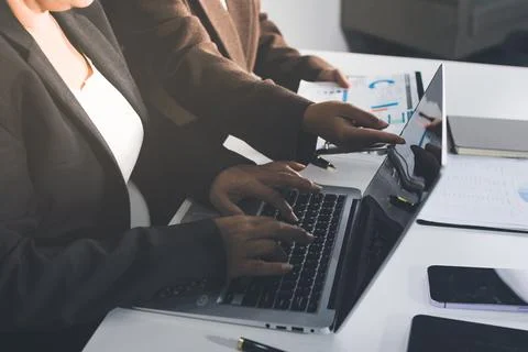 Accountants processing financial documents and taxes, managing corporate fi.. Stockfoto's