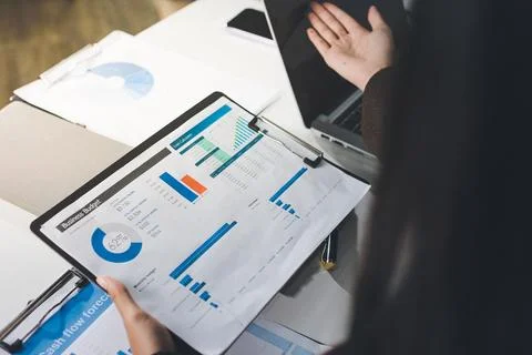 Accountants processing financial documents and taxes, managing corporate fi.. Foto stock