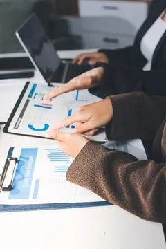 Accountants processing financial documents and taxes, managing corporate fi.. Stock Photos