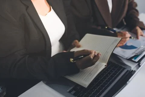 Accountants processing financial documents and taxes, managing corporate fi.. Stockfoto's