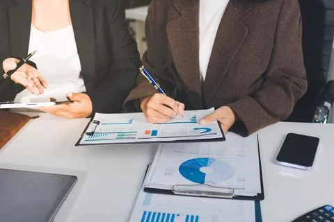 Accountants processing financial documents and taxes, managing corporate fi.. Foto stock