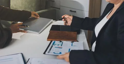Accountants processing financial documents and taxes, managing corporate fi.. Stock Photos