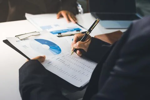 Accountants processing financial documents and taxes, managing corporate fi.. Stock Photos