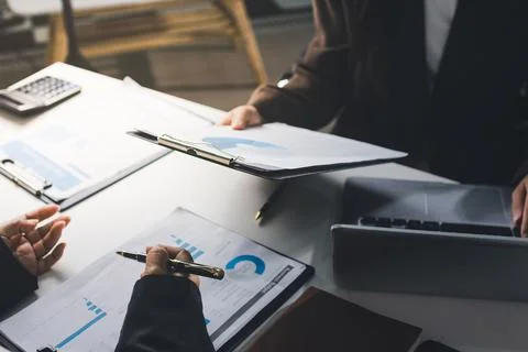 Accountants processing financial documents and taxes, managing corporate fi.. Stock Photos