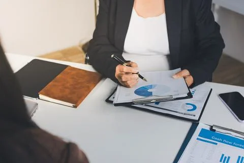 Accountants processing financial documents and taxes, managing corporate fi.. Foto stock