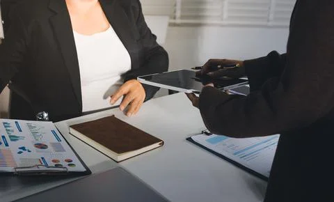 Accountants processing financial documents and taxes, managing corporate fi.. Stockfoto's