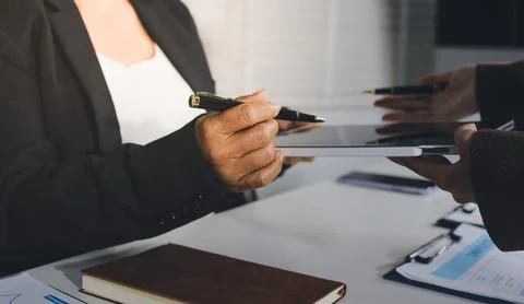 Accountants processing financial documents and taxes, managing corporate fi.. 写真素材