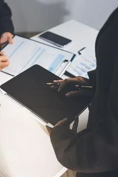 Accountants processing financial documents and taxes, managing corporate fi.. Stock Photos