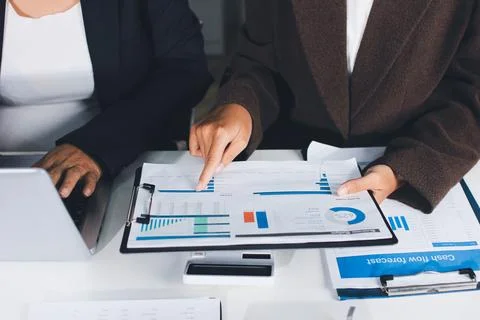 Accountants processing financial documents and taxes, managing corporate fi.. Stock Photos