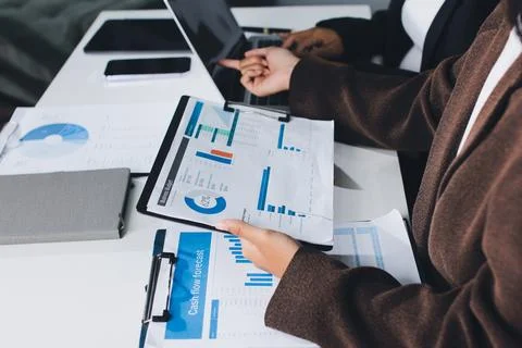 Accountants processing financial documents and taxes, managing corporate fi.. Foto stock