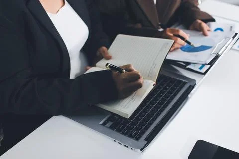 Accountants processing financial documents and taxes, managing corporate fi.. Stock Photos