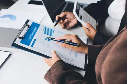 Accountants processing financial documents and taxes, managing corporate fi.. Foto stock