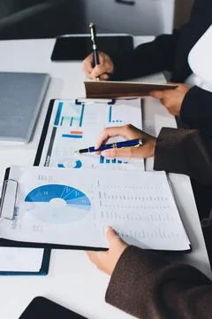 Accountants processing financial documents and taxes, managing corporate fi.. Foto stock