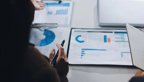 Accountants processing financial documents and taxes, managing corporate fi.. Foto stock