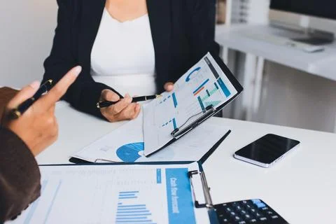 Accountants processing financial documents and taxes, managing corporate fi.. Foto stock