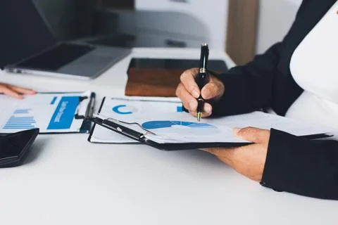 Accountants processing financial documents and taxes, managing corporate fi.. Foto stock