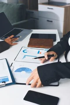 Accountants processing financial documents and taxes, managing corporate fi.. Foto stock