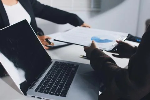 Accountants processing financial documents and taxes, managing corporate fi.. Foto stock