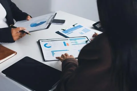Accountants processing financial documents and taxes, managing corporate fi.. Foto stock