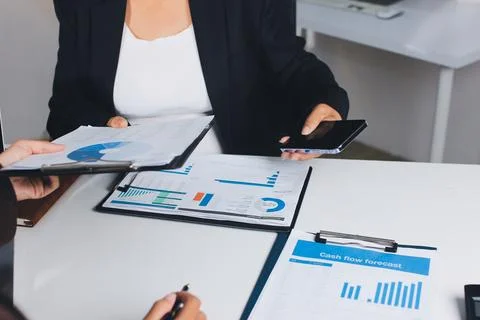 Accountants processing financial documents and taxes, managing corporate fi.. Foto stock