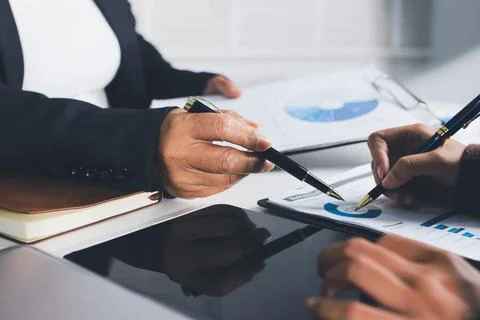 Accountants processing financial documents and taxes, managing corporate fi.. Stock Photos