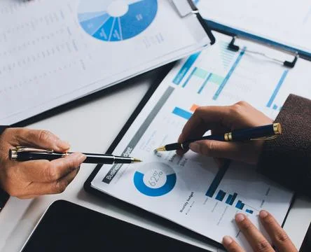 Accountants processing financial documents and taxes, managing corporate fi.. Foto stock