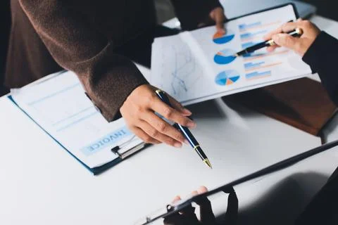 Accountants processing financial documents and taxes, managing corporate fi.. Foto stock
