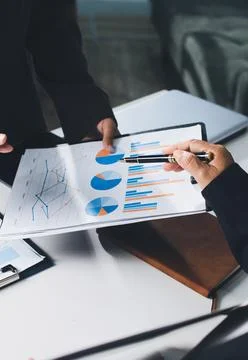 Accountants processing financial documents and taxes, managing corporate fi.. Foto stock