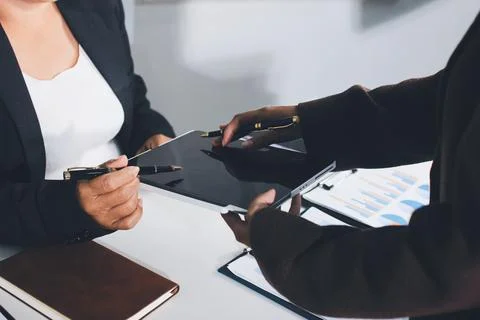 Accountants processing financial documents and taxes, managing corporate fi.. Foto stock
