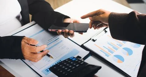 Accountants processing financial documents and taxes, managing corporate fi.. Stock Photos