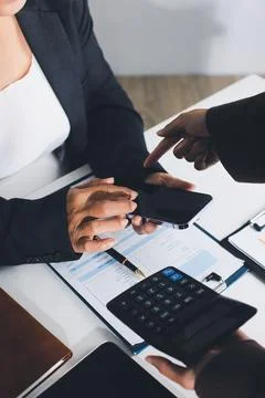 Accountants processing financial documents and taxes, managing corporate fi.. Foto stock