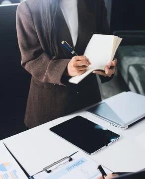 Accountants processing financial documents and taxes, managing corporate fi.. Stock Photos