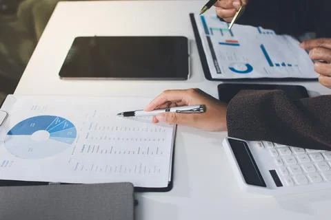 Accountants processing financial documents and taxes, managing corporate fi.. Stock Photos