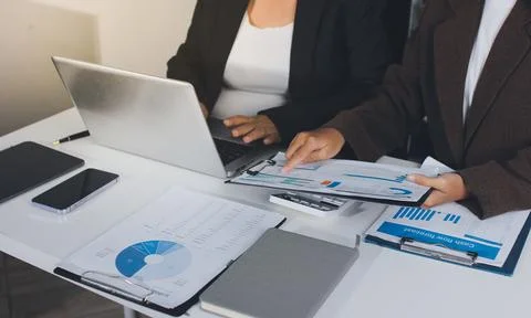 Accountants processing financial documents and taxes, managing corporate fi.. Stock Photos