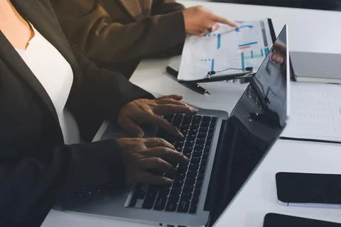 Accountants processing financial documents and taxes, managing corporate fi.. Stock Photos