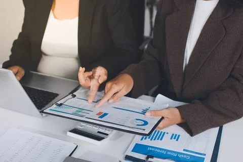 Accountants processing financial documents and taxes, managing corporate fi.. Stock Photos